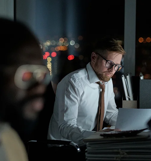 img-hero-about Man writing on a computer