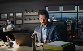 Man working at the office late in the day